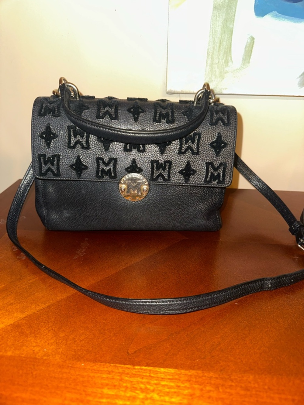 Metrocity: Black Top-Handle Crossbody Bag with Embossed Pattern